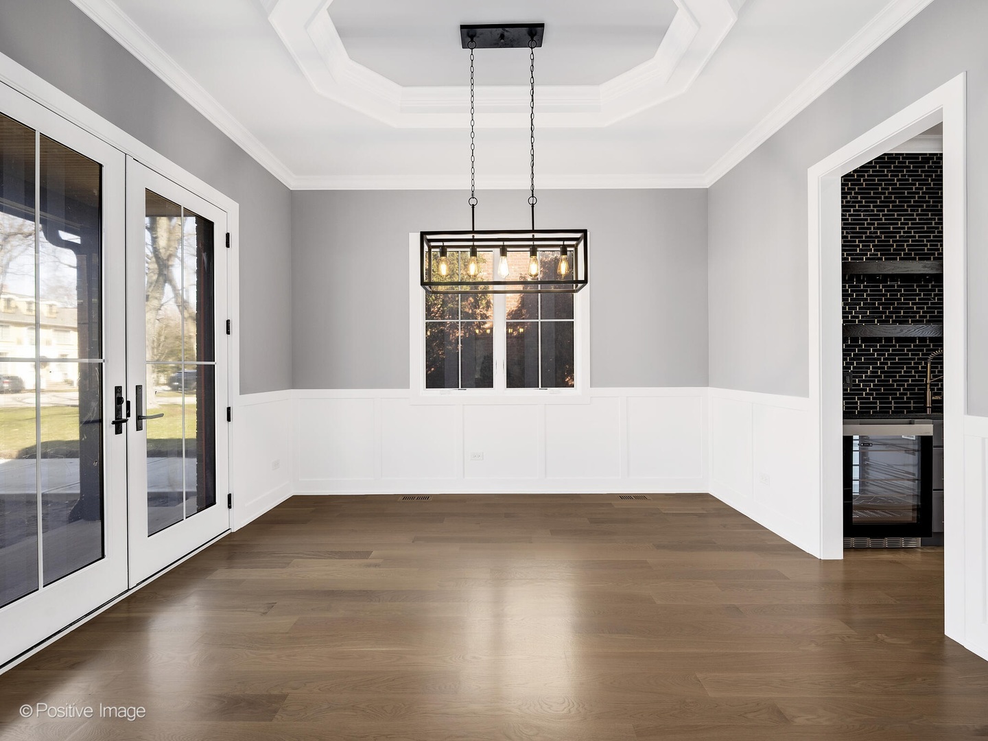 609 North County Line Road Hinsdale, IL 60521 - Photo 11 of 42 a view of empty room with wooden floor and fan