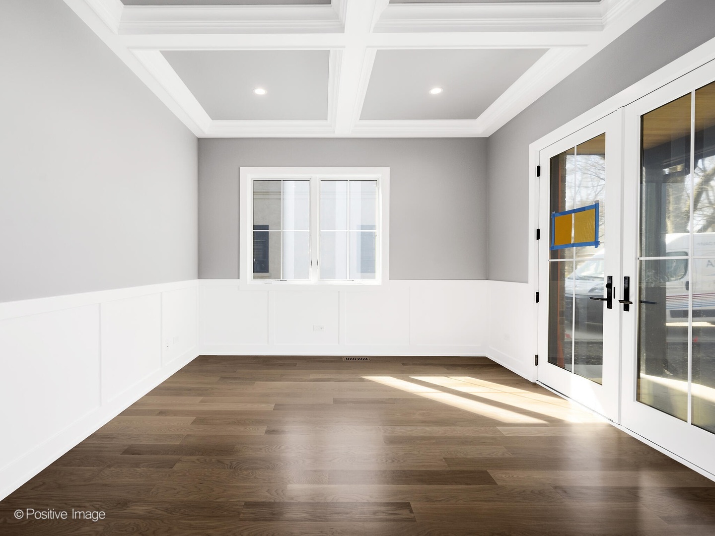 609 North County Line Road Hinsdale, IL 60521 - Photo 14 of 42 a view of an empty room with wooden floor and a window