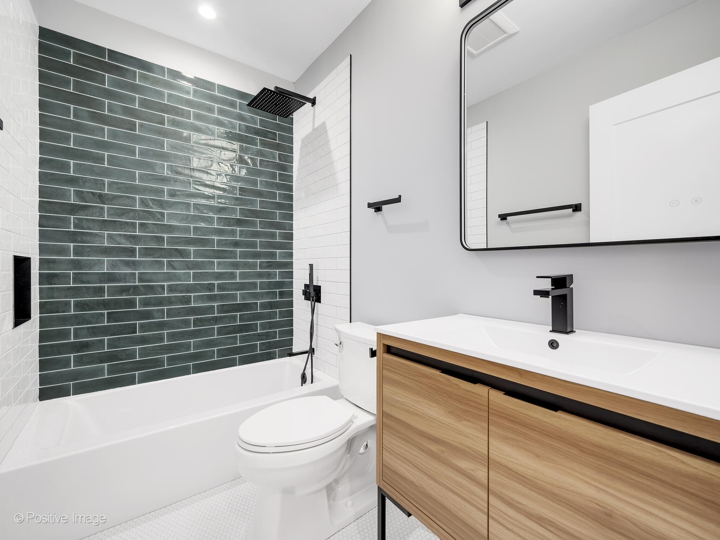 609 North County Line Road Hinsdale, IL 60521 - Photo 17 of 42 a bathroom with a sink toilet and shower