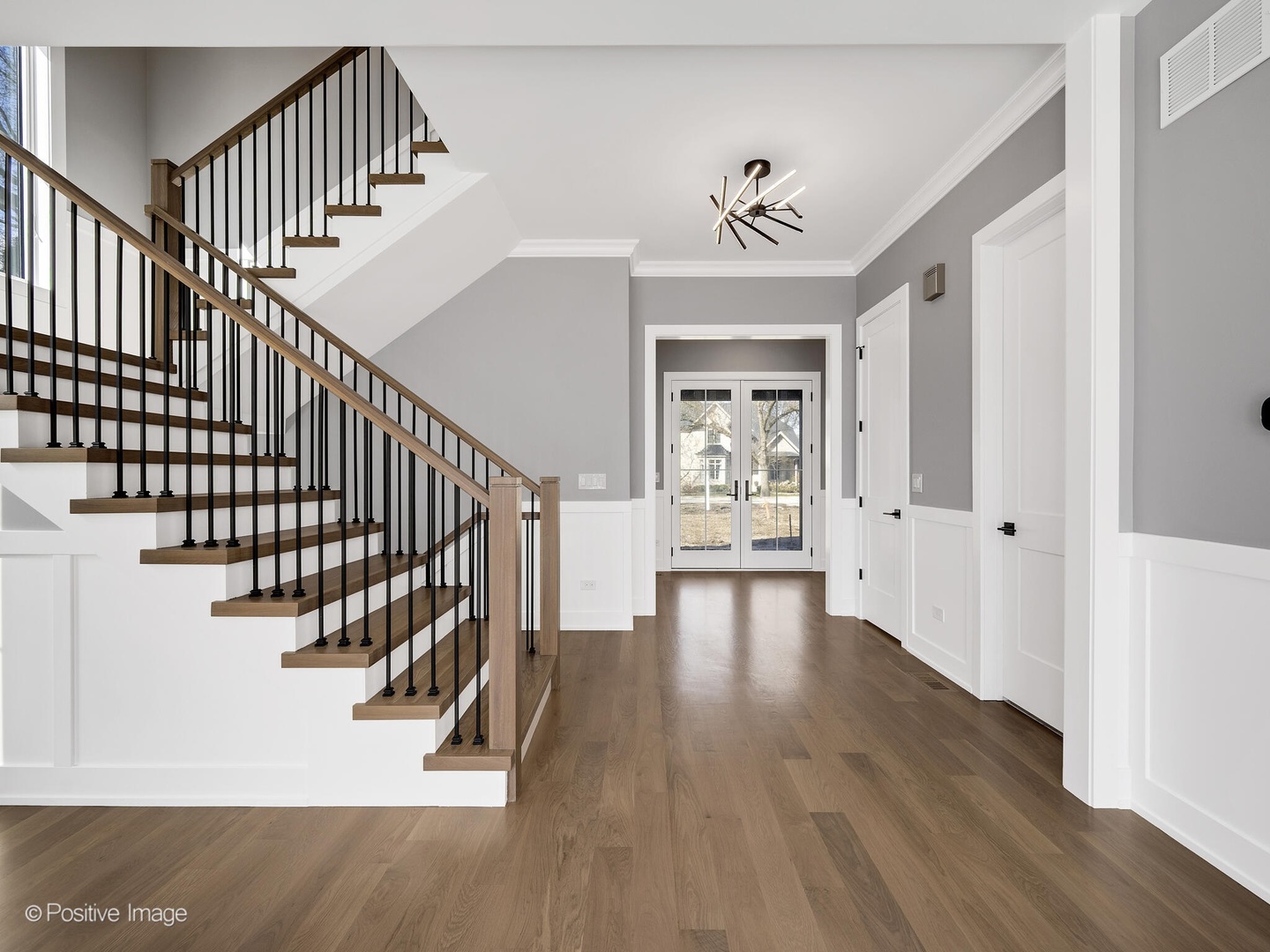 609 North County Line Road Hinsdale, IL 60521 - Photo 2 of 42 a view of entryway with wooden floor