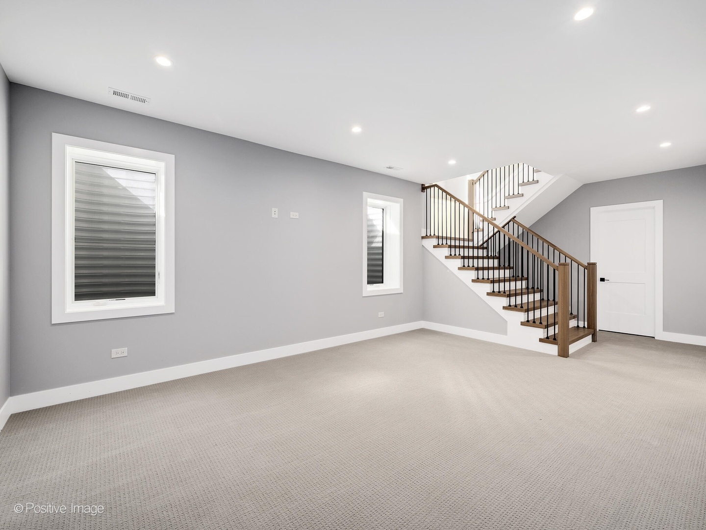609 North County Line Road Hinsdale, IL 60521 - Photo 30 of 42 a view of an empty room with stairs and a window
