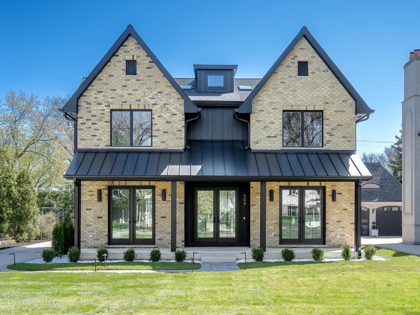 609 North County Line Road Hinsdale, IL 60521 - Photo 37 of 42 a view of a house with a yard and furniture