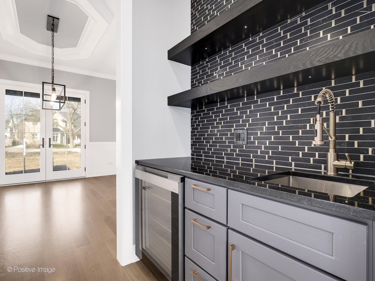 609 North County Line Road Hinsdale, IL 60521 - Photo 4 of 42 a kitchen with a sink and cabinets