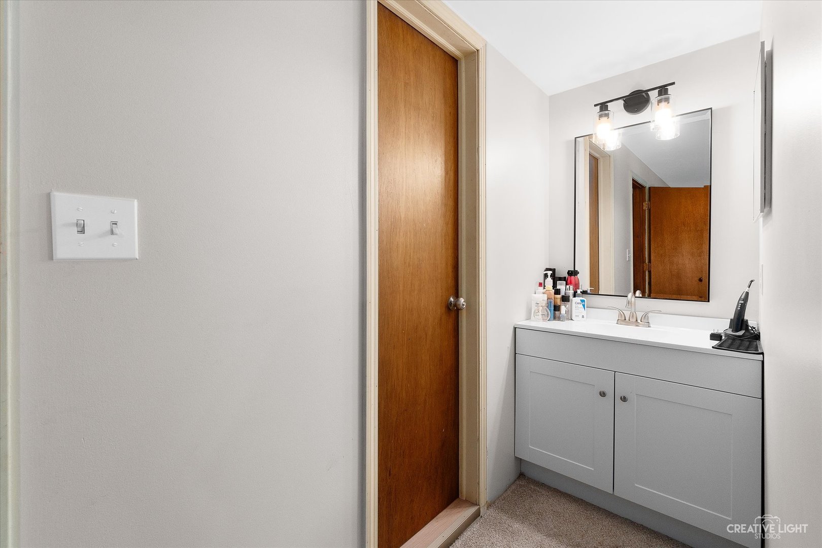 8N510 Thomas Road Hampshire, IL 60140 - Photo 15 of 33 a bathroom with a double vanity sink and mirror