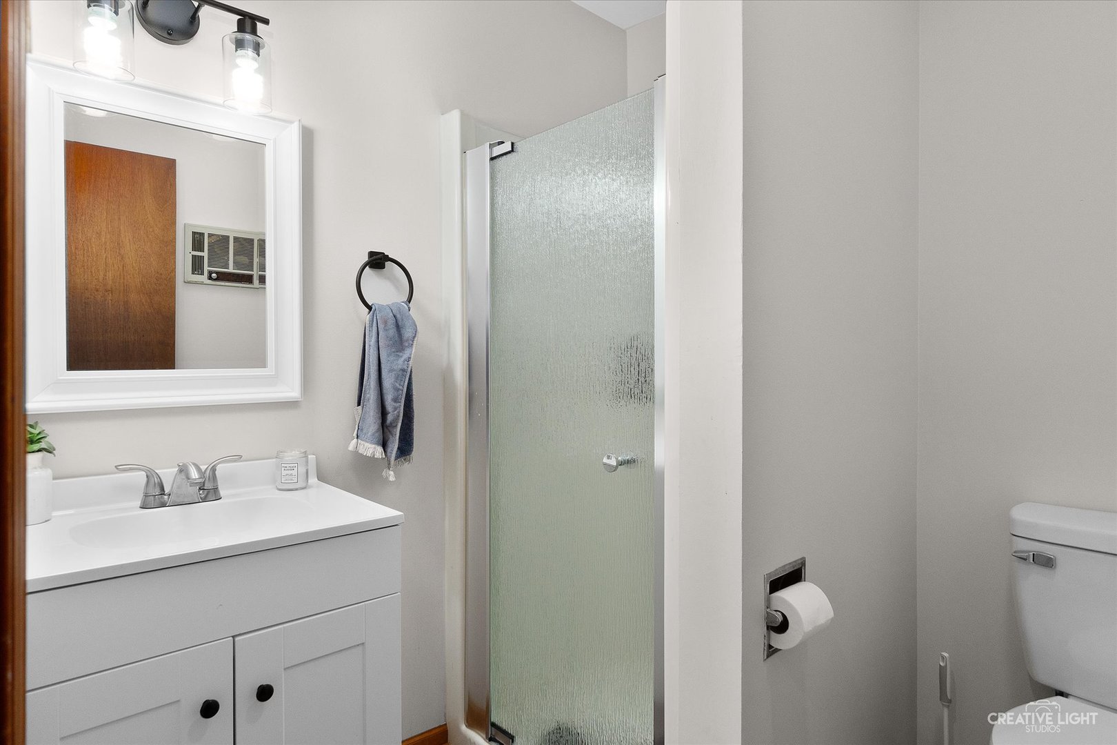 8N510 Thomas Road Hampshire, IL 60140 - Photo 19 of 33 a bathroom with a sink a toilet and shower