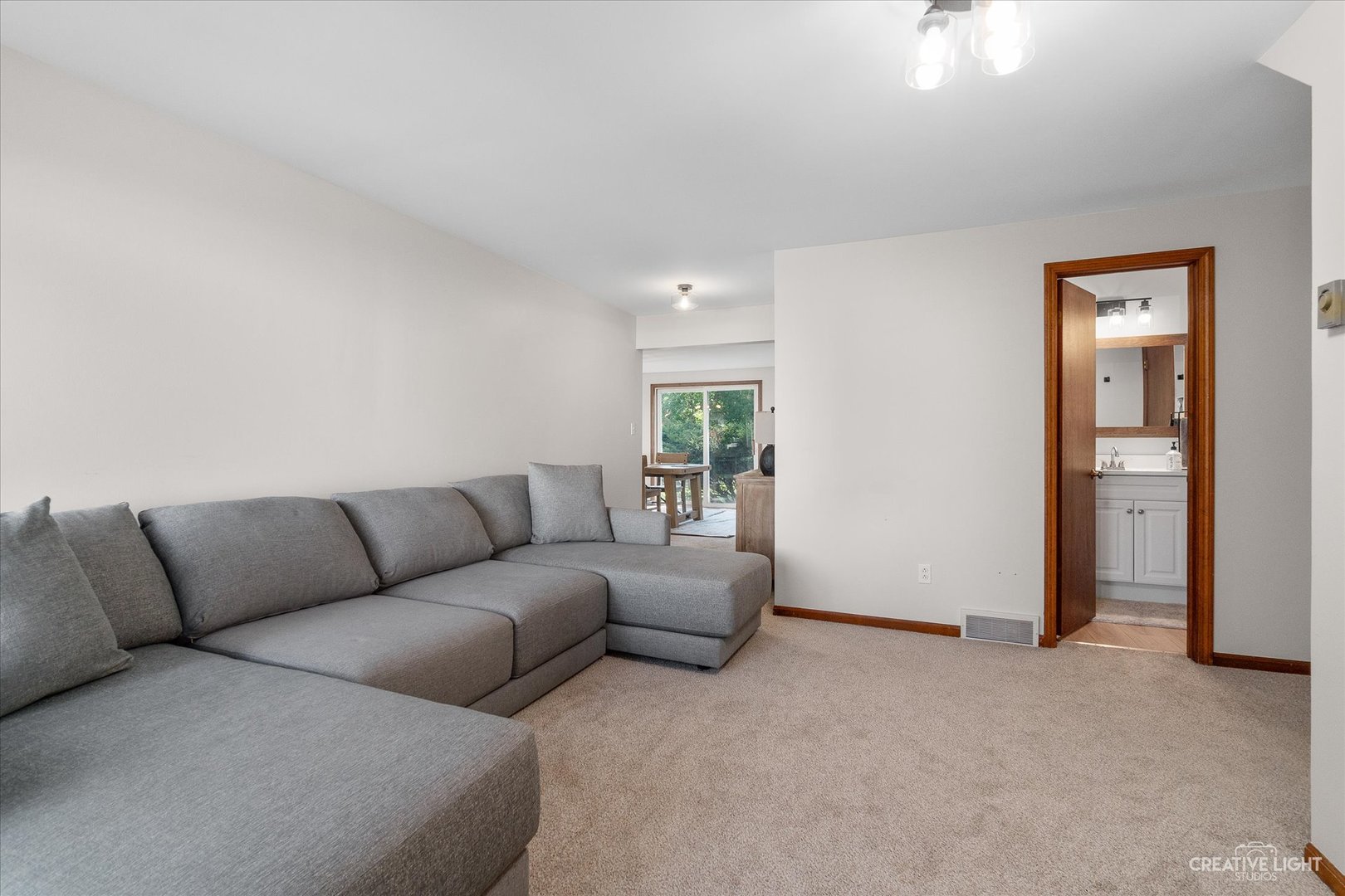 8N510 Thomas Road Hampshire, IL 60140 - Photo 5 of 33 a living room with furniture and a walk in closet