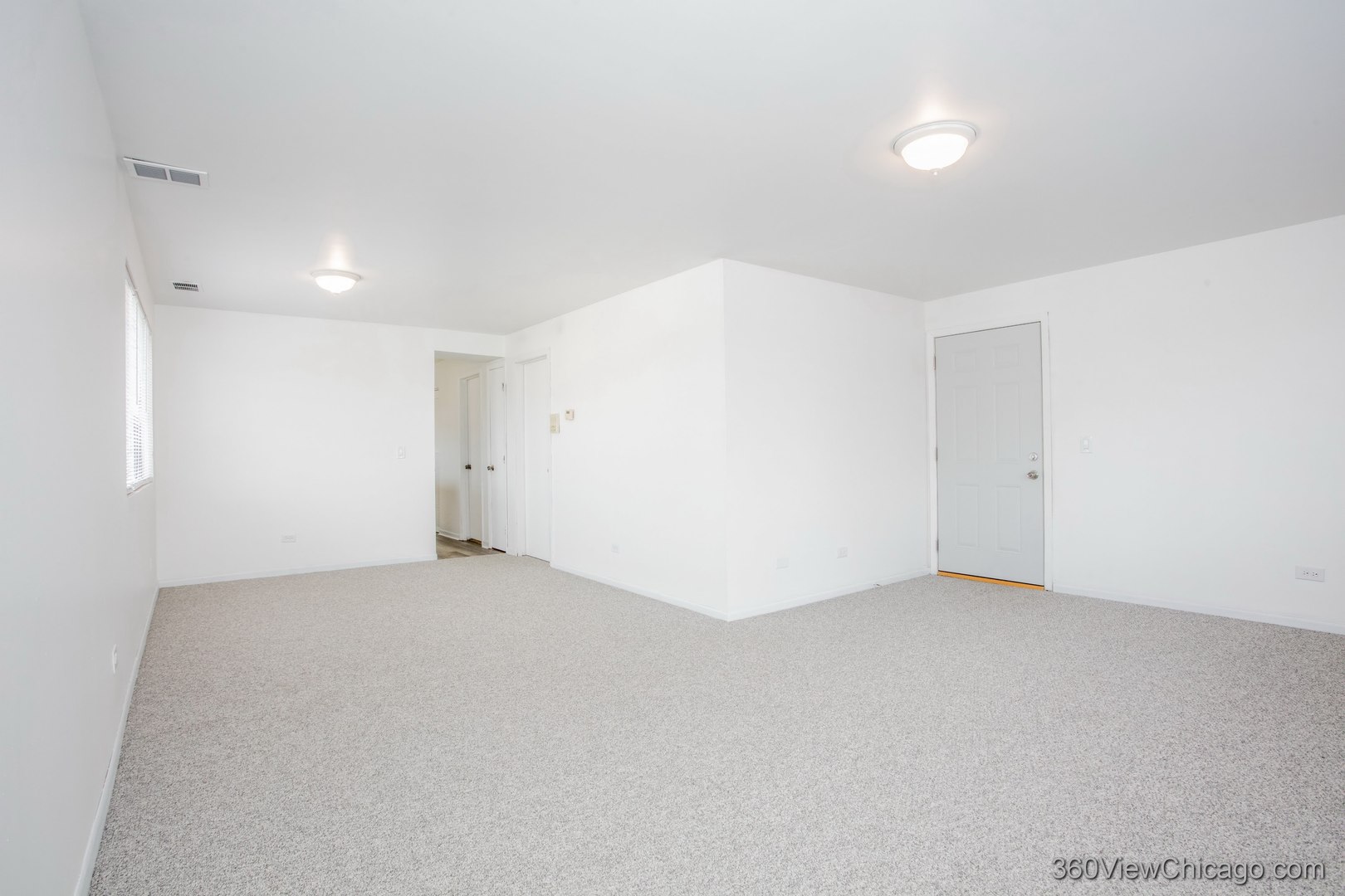 7459 North Waukegan Road, Unit 3 Niles, IL 60714 - Photo 3 of 17 a view of an empty room