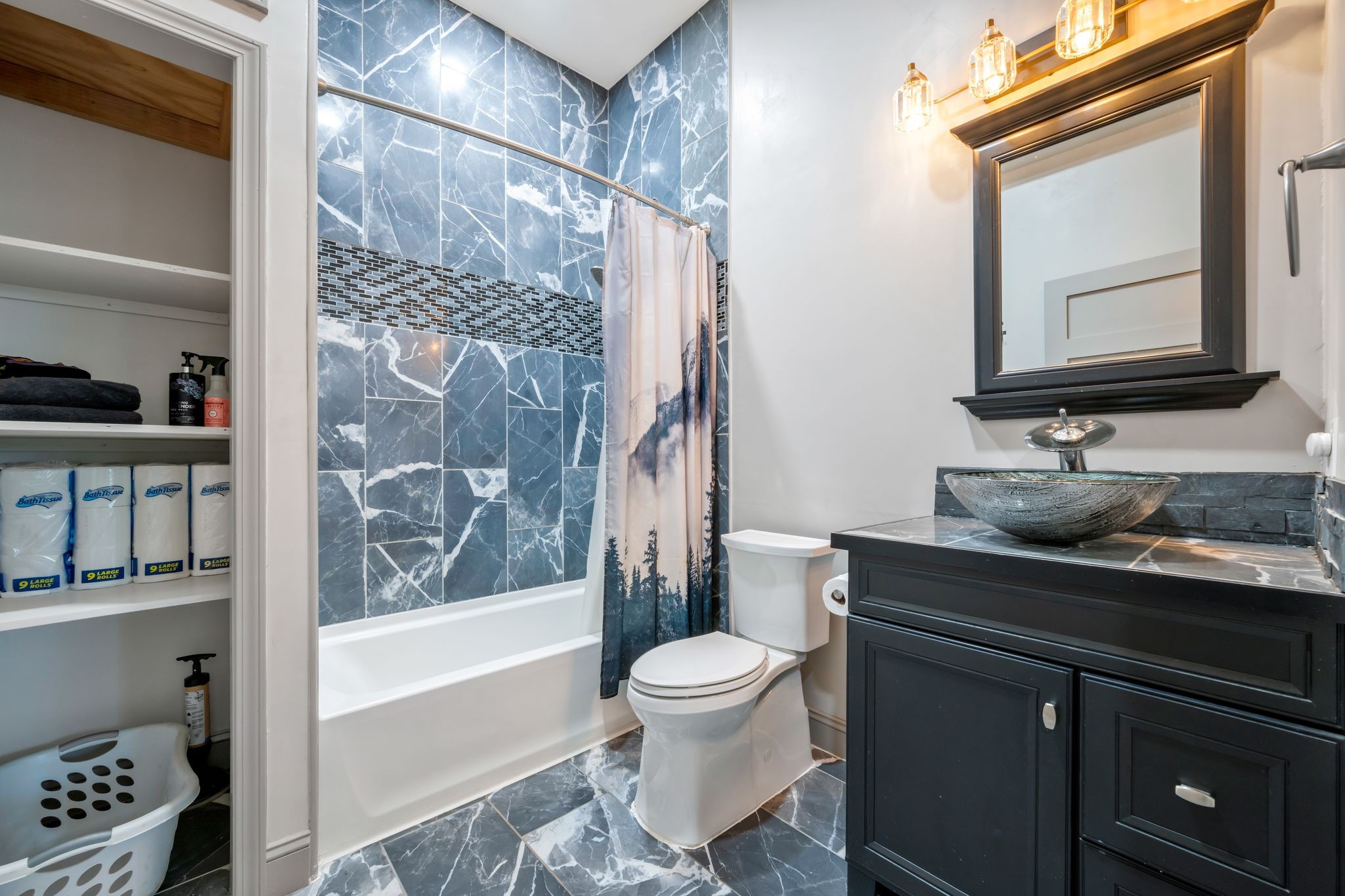 399 Coaling Road Charlotte, TN 37036 - Photo 26 of 73 a bathroom with a granite countertop sink toilet a mirror and shower