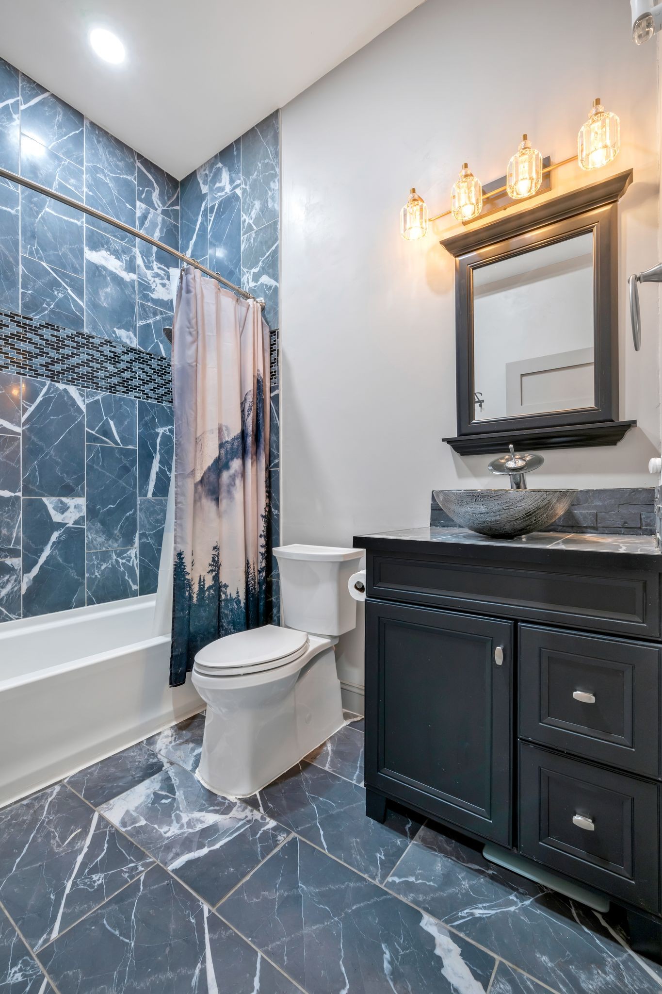 399 Coaling Road Charlotte, TN 37036 - Photo 27 of 73 a bathroom with a sink toilet and shower