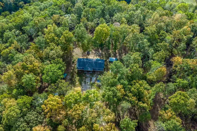 a view of a garden with a building