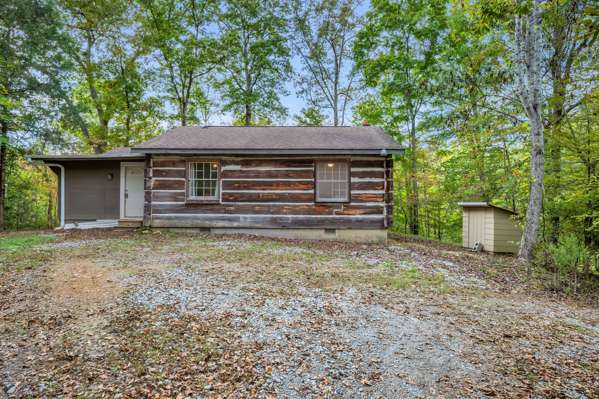 399 Coaling Road Charlotte, TN 37036 - Photo 38 of 73 a front view of a house with a garden