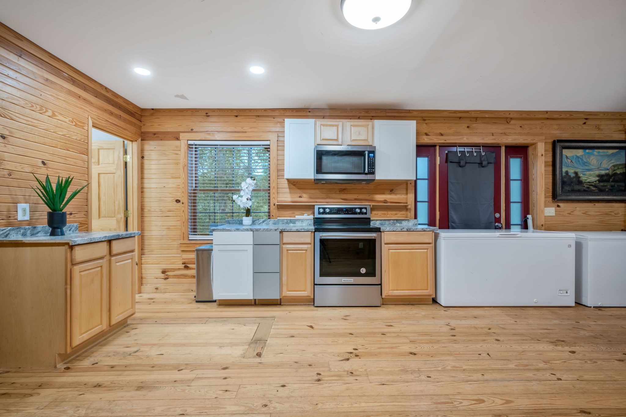 399 Coaling Road Charlotte, TN 37036 - Photo 41 of 73 a kitchen with stainless steel appliances a stove and a sink