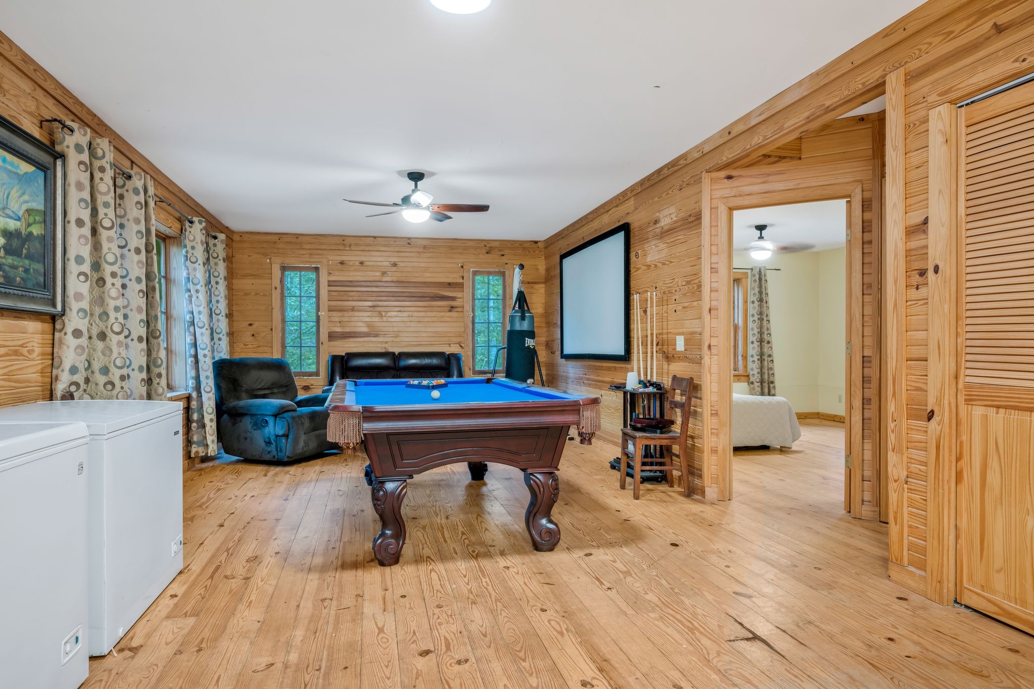 399 Coaling Road Charlotte, TN 37036 - Photo 42 of 73 a living room with furniture a rug and a large window