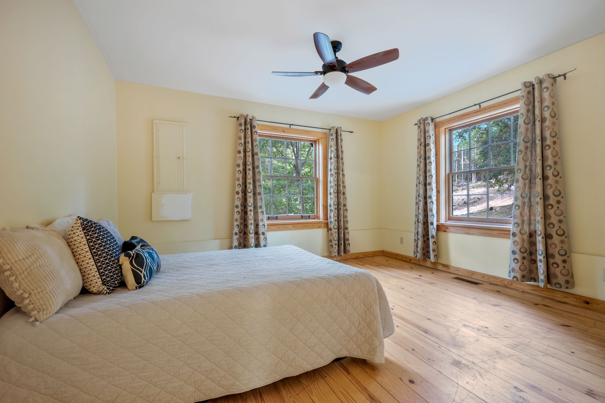 399 Coaling Road Charlotte, TN 37036 - Photo 46 of 73 a bedroom with a large bed window and closet