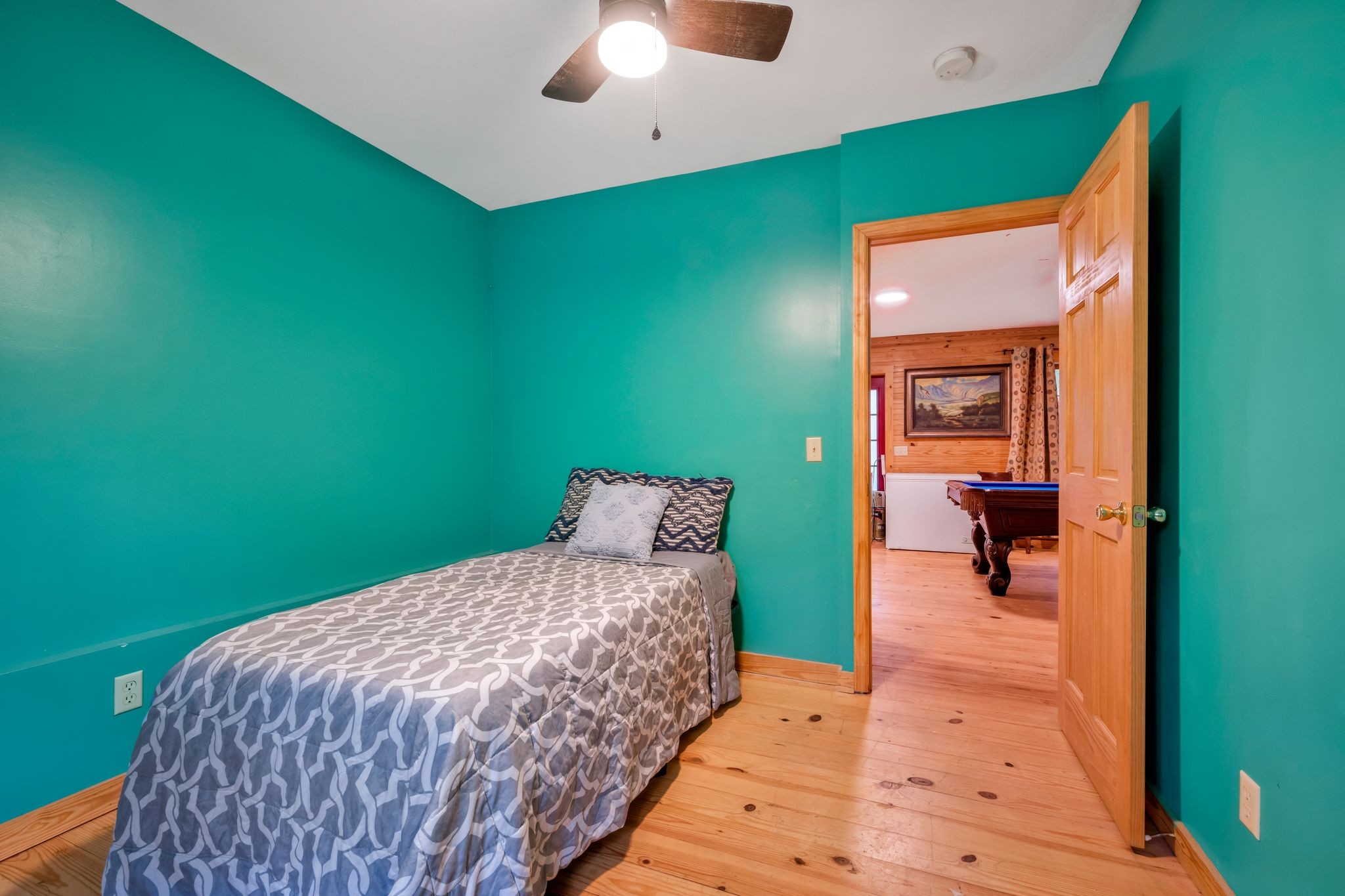 399 Coaling Road Charlotte, TN 37036 - Photo 50 of 73 a bedroom with a bed and a large window