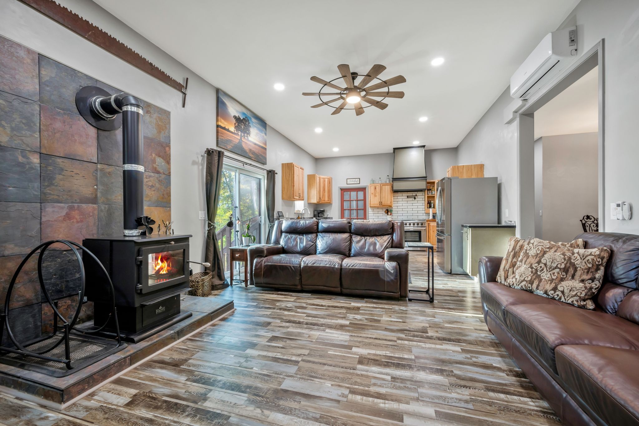 399 Coaling Road Charlotte, TN 37036 - Photo 5 of 73 a living room with furniture and a fireplace