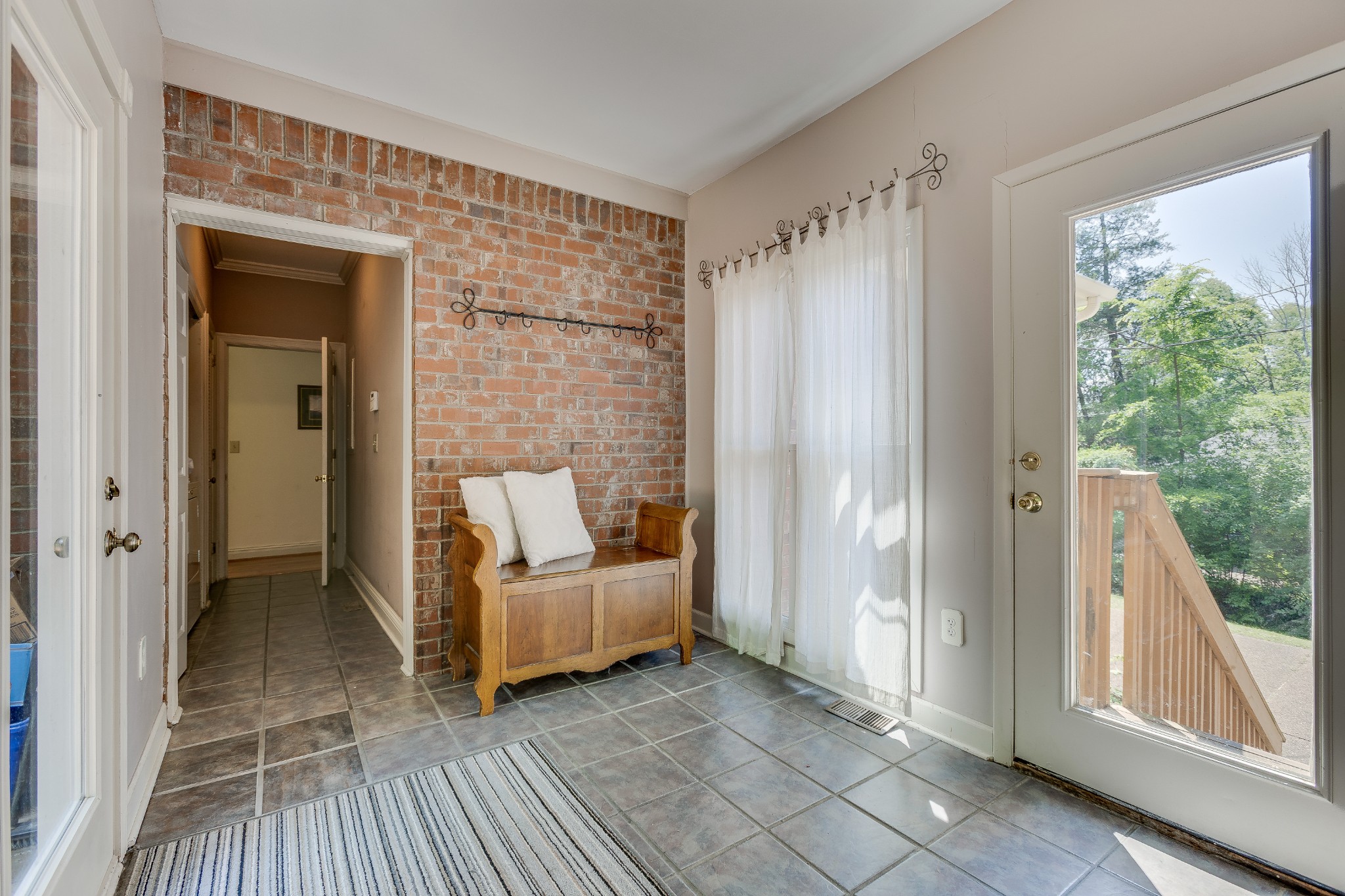 1111 Temple Ridge Court Nashville, TN 37221 - Photo 36 of 46 a view of a bedroom with wooden floor and windows