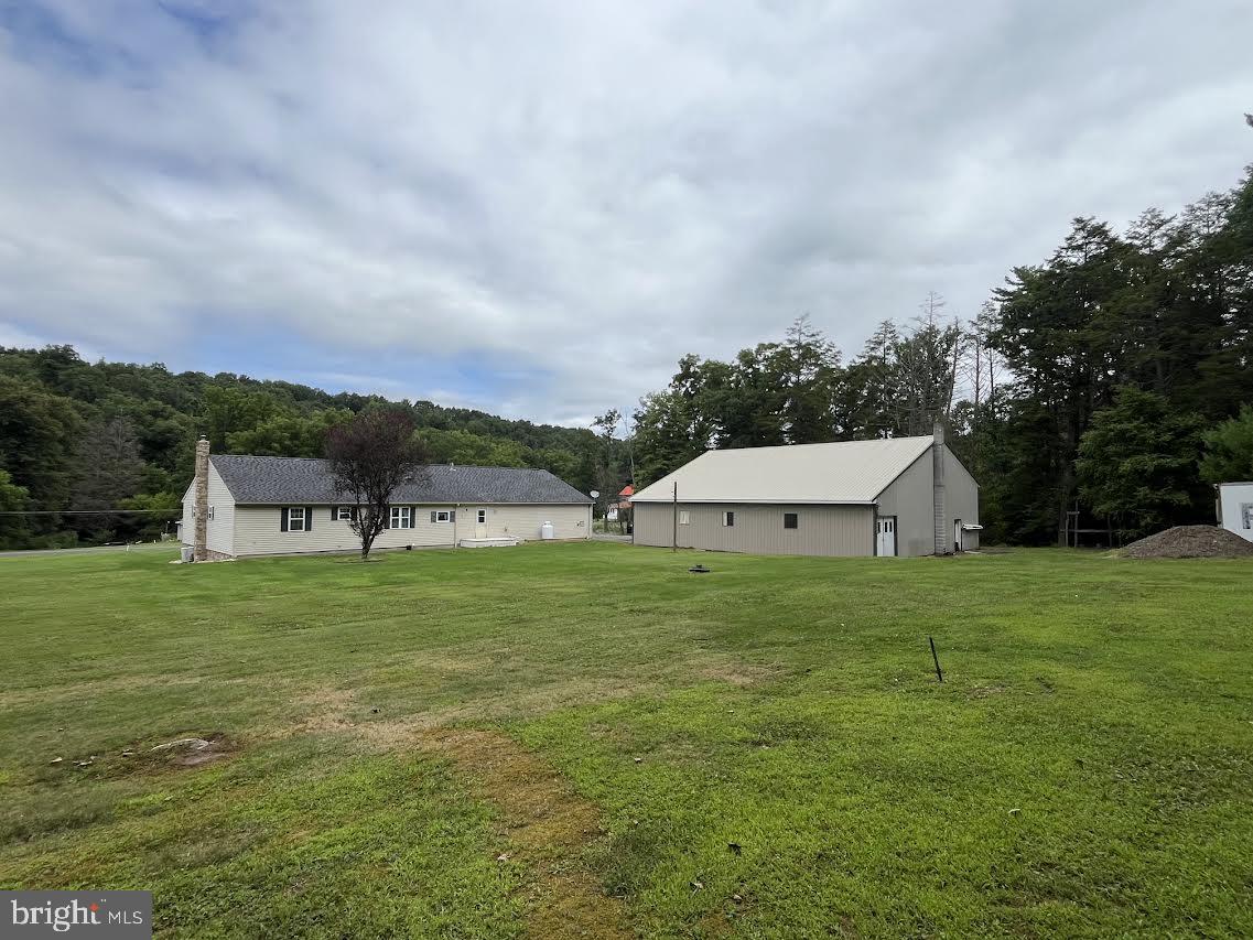 230 Summit Road McClure, PA 17841 - Photo 47 of 52 Rear house and garage