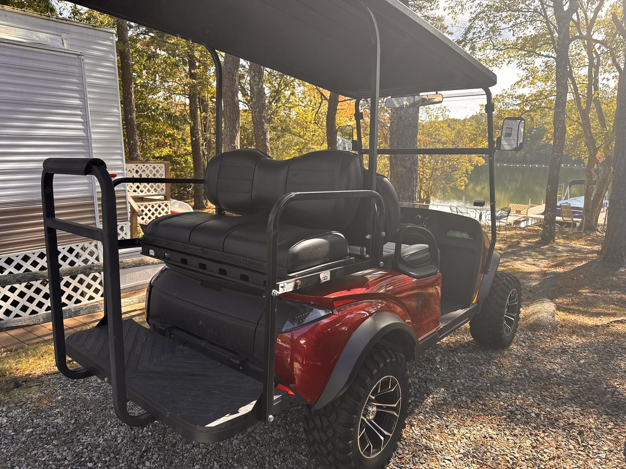 185 Cotuit Road, Unit BE4 Sandwich, MA 02563 - Photo 13 of 29 a roof deck with table and chairs under an umbrella