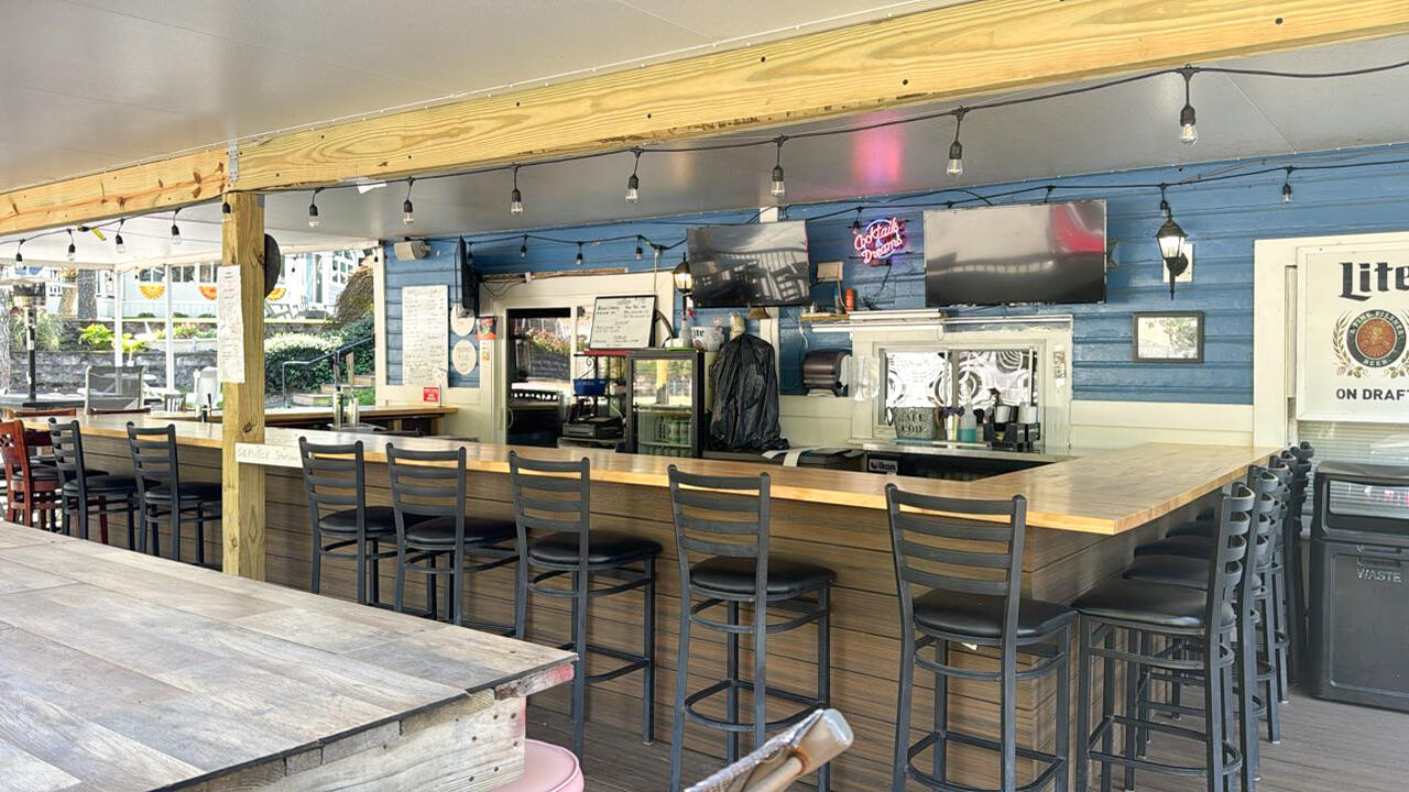 185 Cotuit Road, Unit BE4 Sandwich, MA 02563 - Photo 20 of 29 a dining table with chairs and window