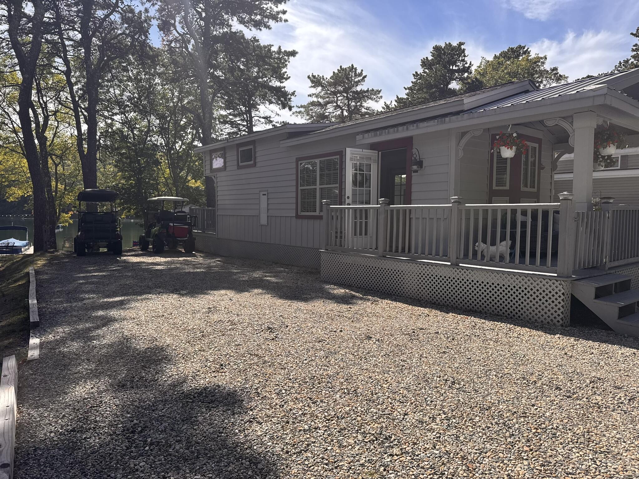 185 Cotuit Road, Unit BE4 Sandwich, MA 02563 - Photo 2 of 29 a view of a house with a snow in the yard