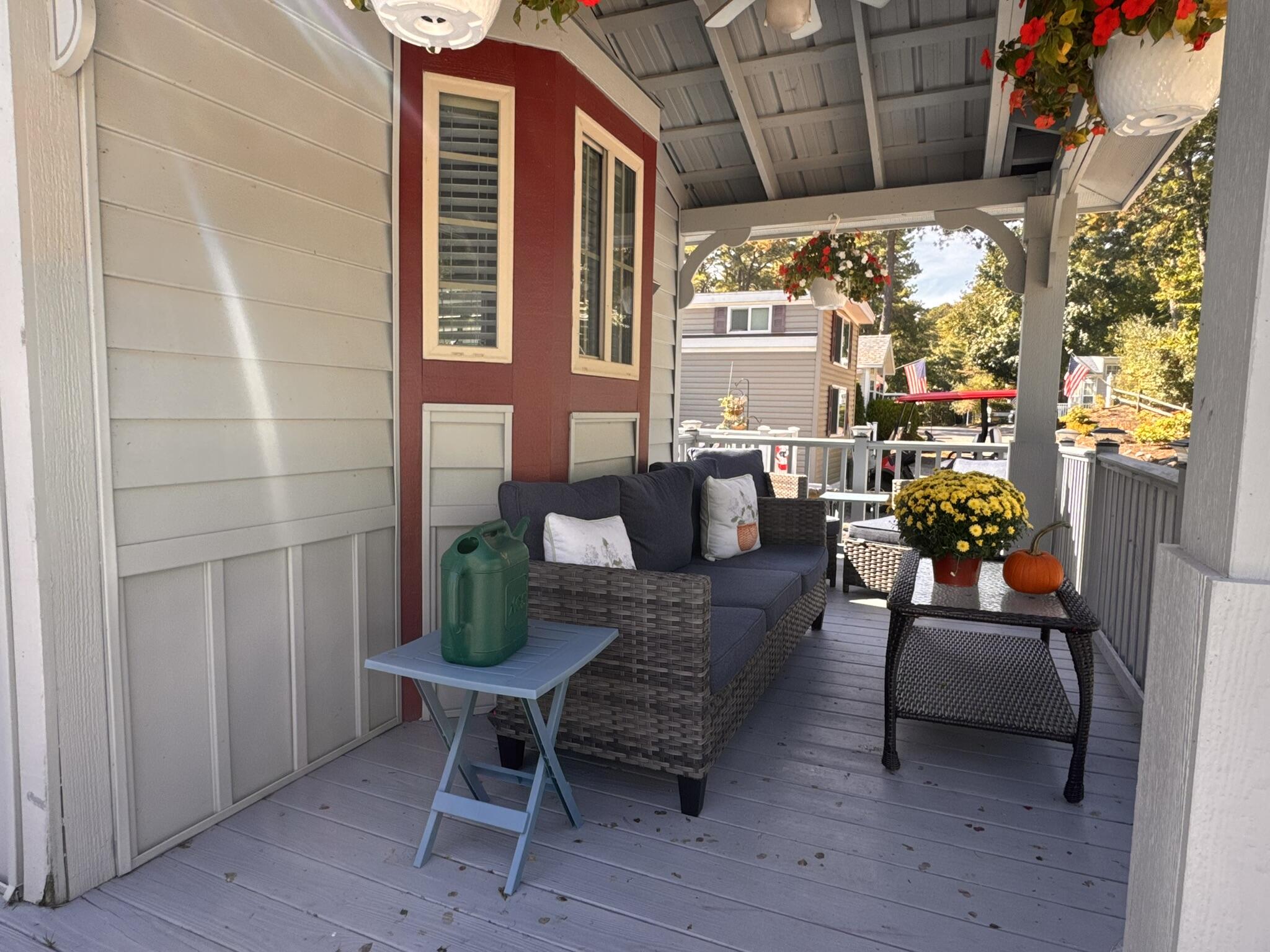 185 Cotuit Road, Unit BE4 Sandwich, MA 02563 - Photo 4 of 29 a outdoor living space with furniture and a potted plant