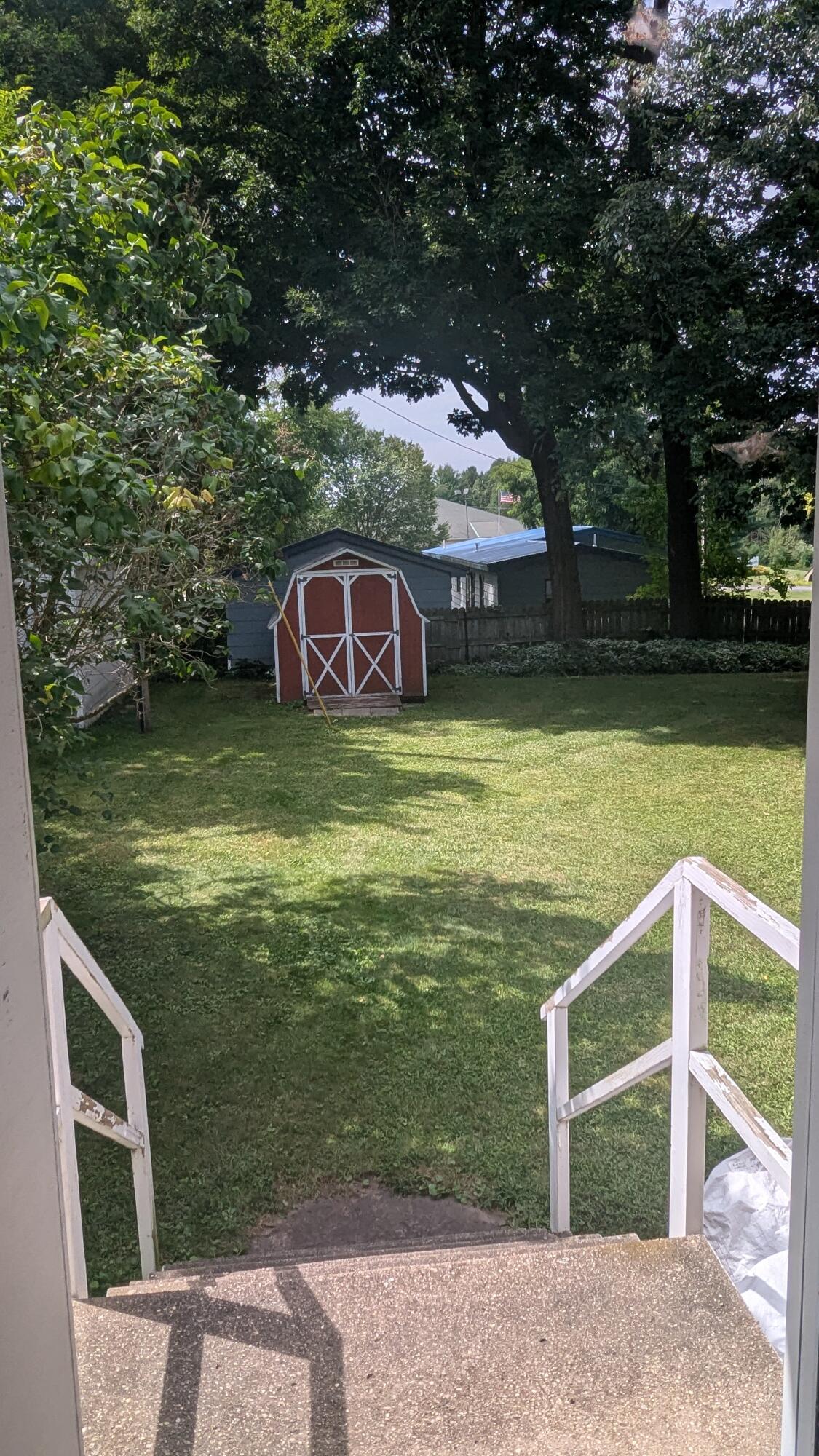 12220 Maple Street Bear Lake, MI 49614 - Photo 29 of 56 Garage Porch