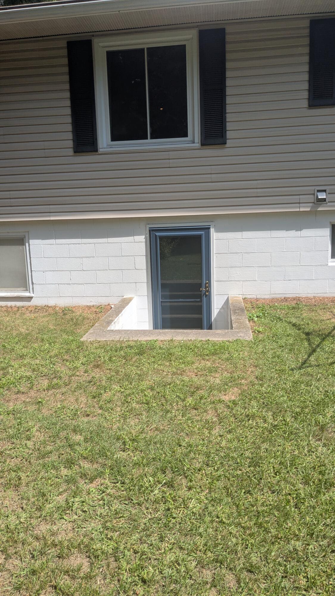 12220 Maple Street Bear Lake, MI 49614 - Photo 47 of 56 Walkout Basement Access