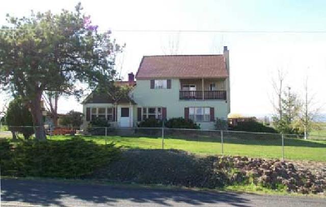 1706 Stein Road Yakima, WA 98908 - Photo 1 of 5 a view of a house with a yard