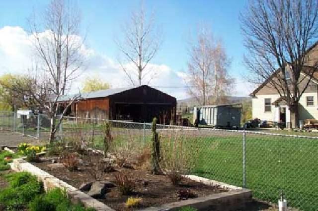 1706 Stein Road Yakima, WA 98908 - Photo 5 of 5 a front view of a house with garden