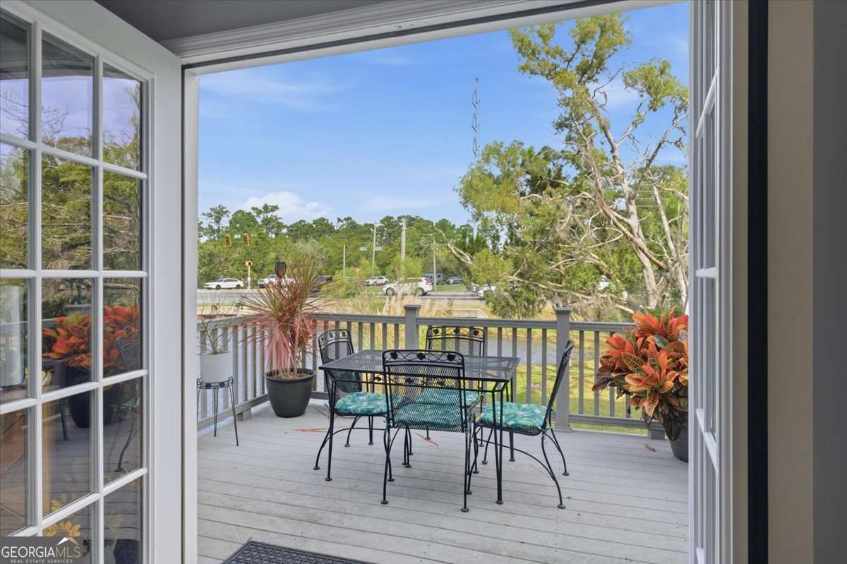 1000 Sea Island Road, Unit 68 St. Simons, GA 31522 - Photo 3 of 19 Outdoor Patio overlooking the lagoon & fountain