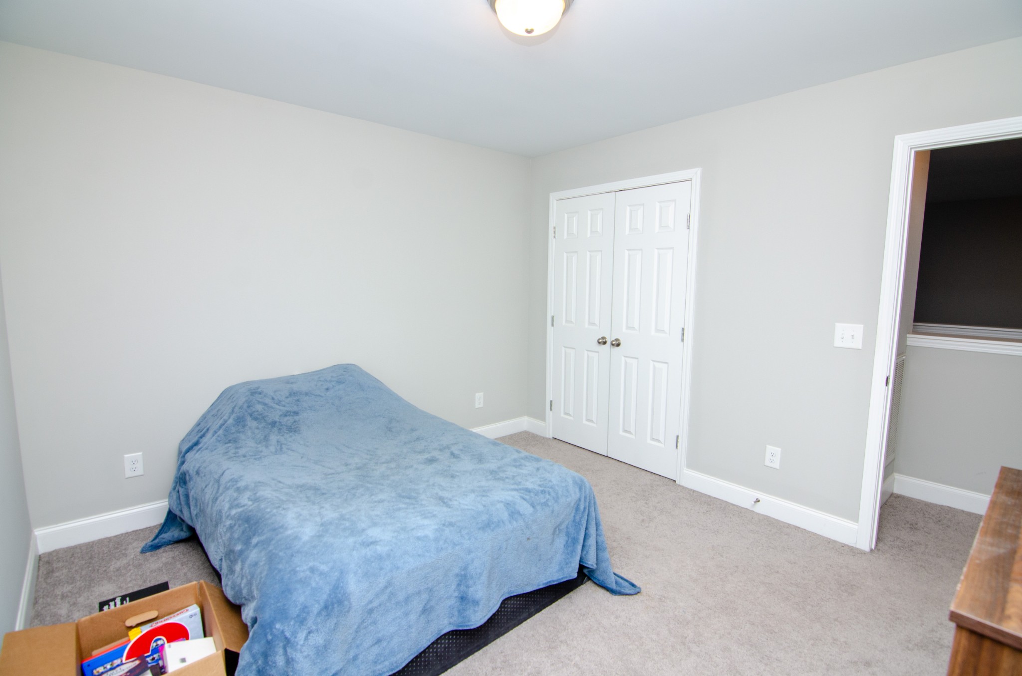1060 Westgate Drive Gallatin, TN 37066 - Photo 27 of 31 a bedroom with a bed and a dresser