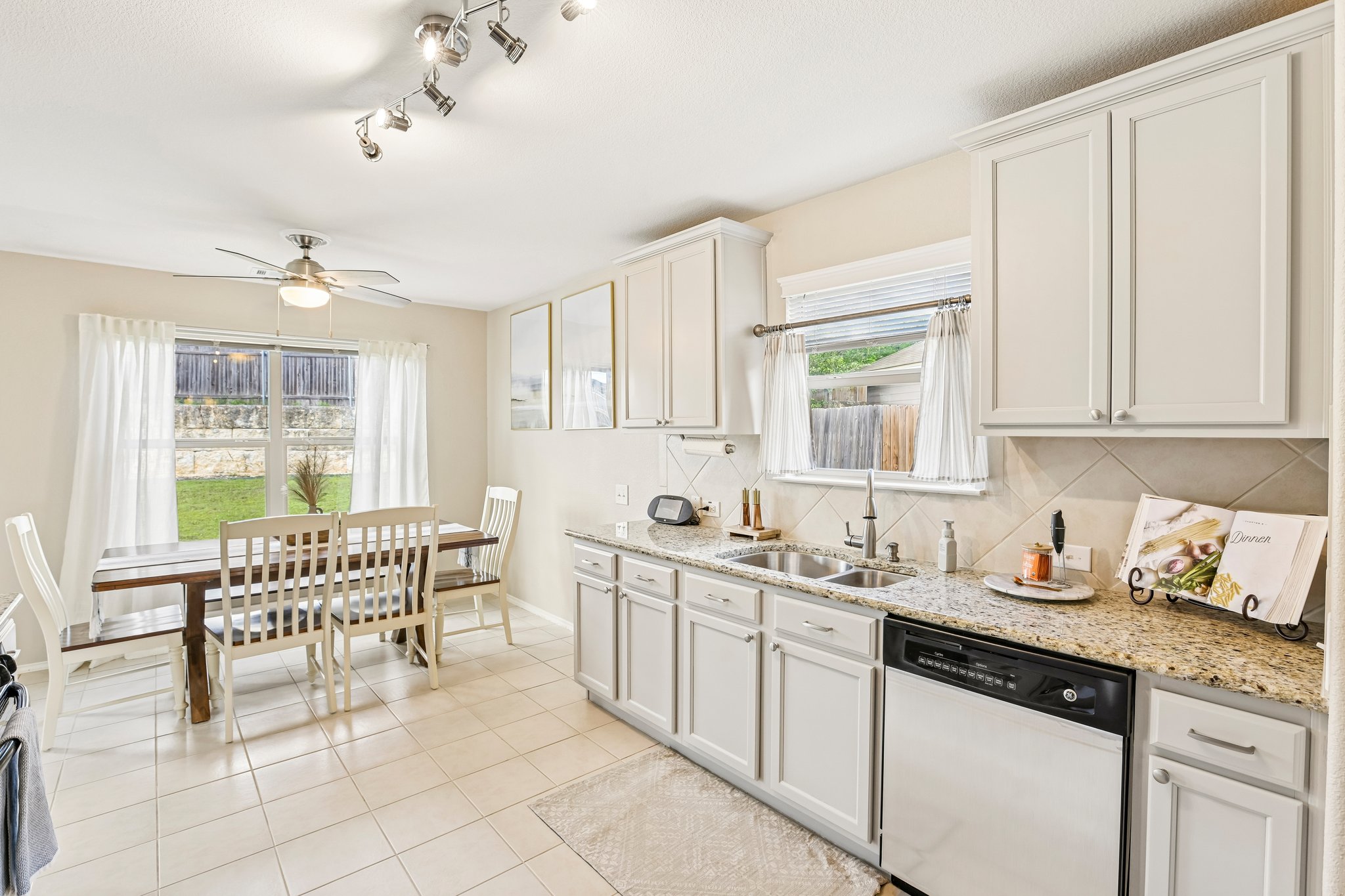 5508 Emma Thompson Way Austin, TX 78747 - Photo 16 of 34 Abundant storage and beautiful natural light make this kitchen both highly functional and an enjoyable space to cook, gather, and entertain.