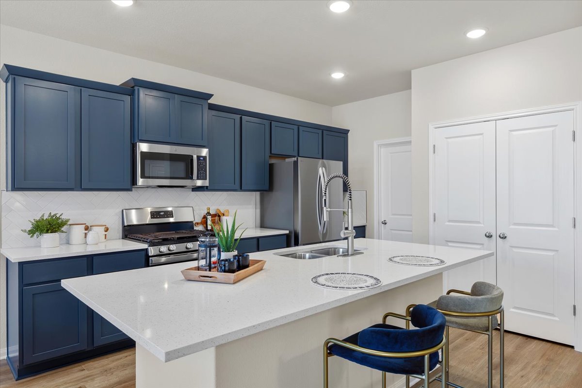 161 Spangle Way Kyle, TX 78640 - Photo 10 of 33 The kitchen was designed for both style and function!