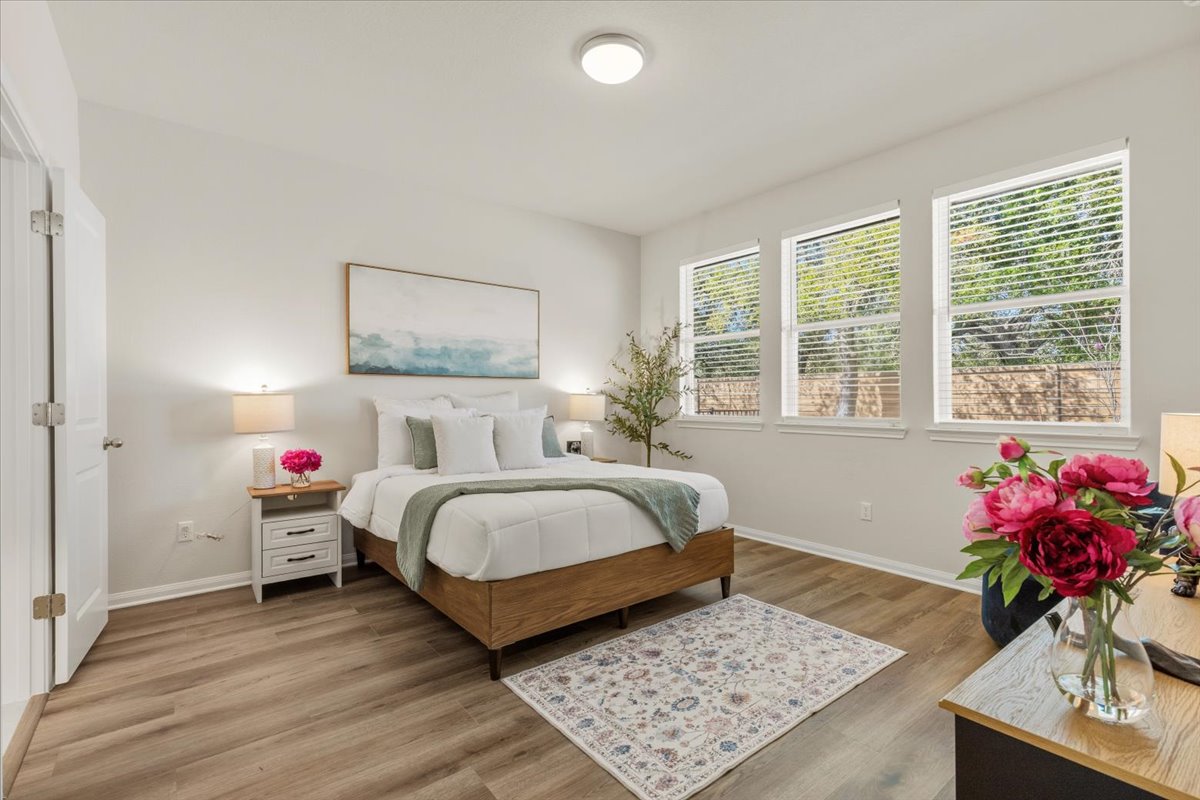 161 Spangle Way Kyle, TX 78640 - Photo 16 of 33 The owner’s retreat was intentionally tucked at the rear for privacy.