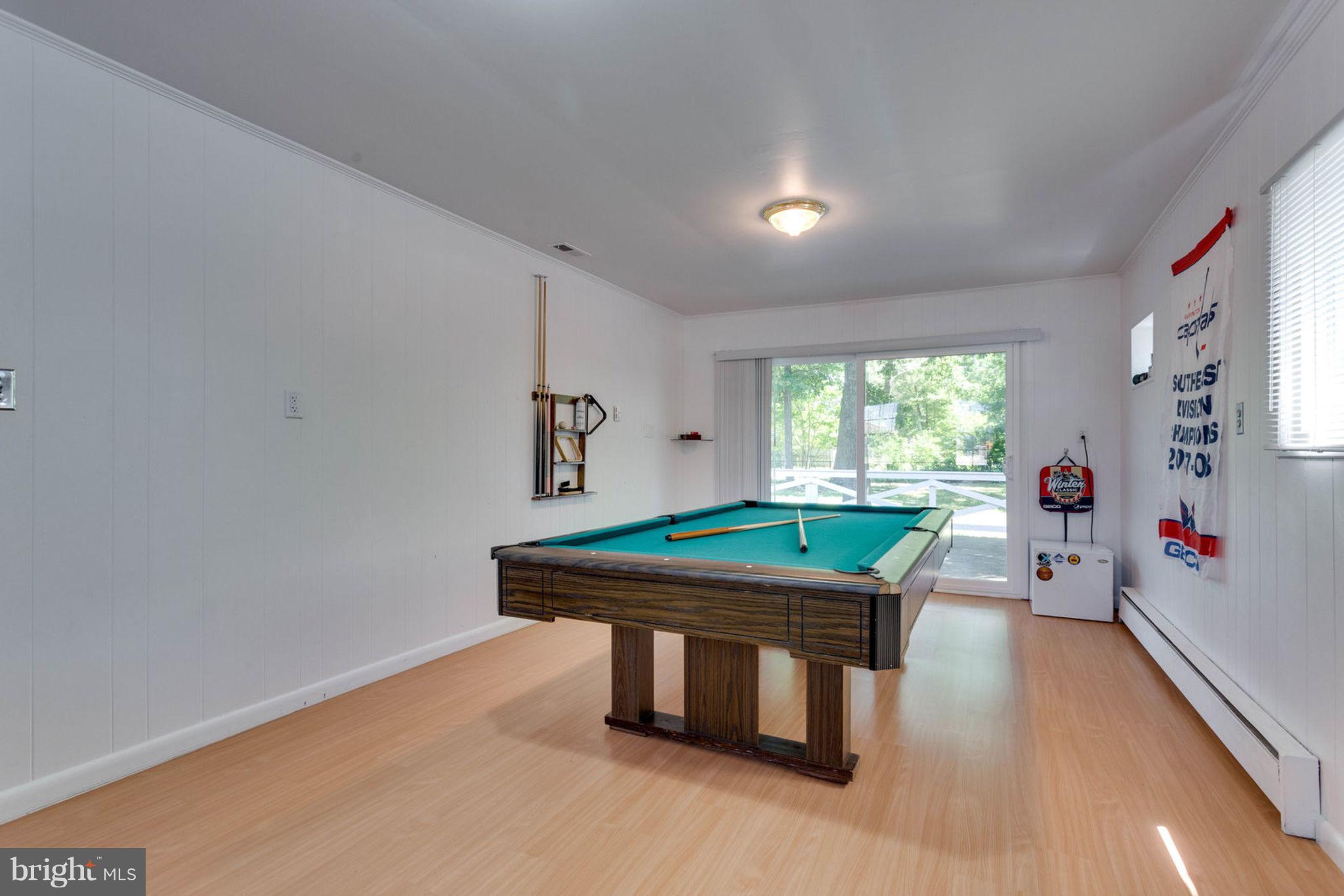 6405 Franconia Road Springfield, VA 22150 - Photo 17 of 26 Large entertainment room with lead out to backyard