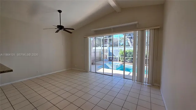 a view of an empty room and window