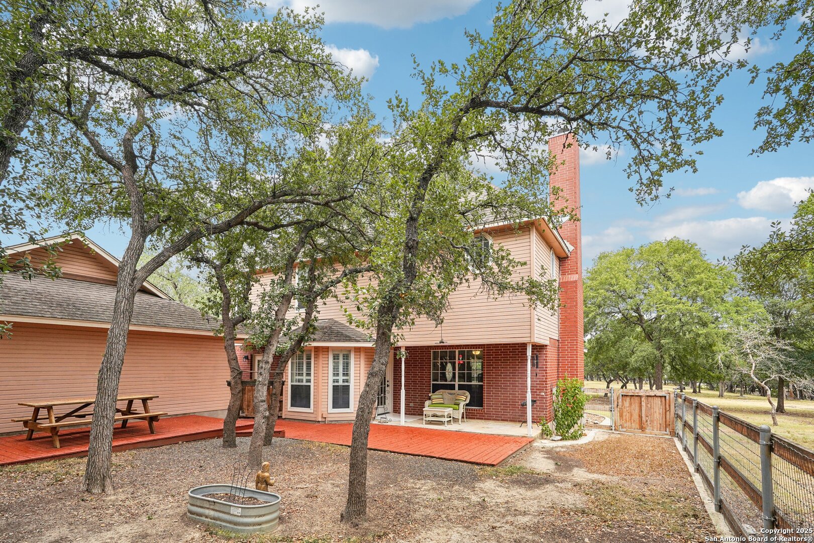 2785 Firethorn Path Spring Branch, TX 78070 - Photo 45 of 54 a front view of a house with garden