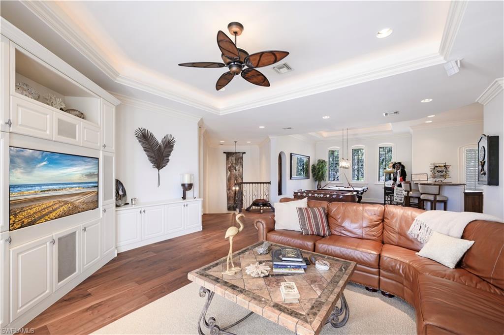 361 Pirates Bight Naples, FL 34103 - Photo 28 of 45 a living room with furniture and kitchen view