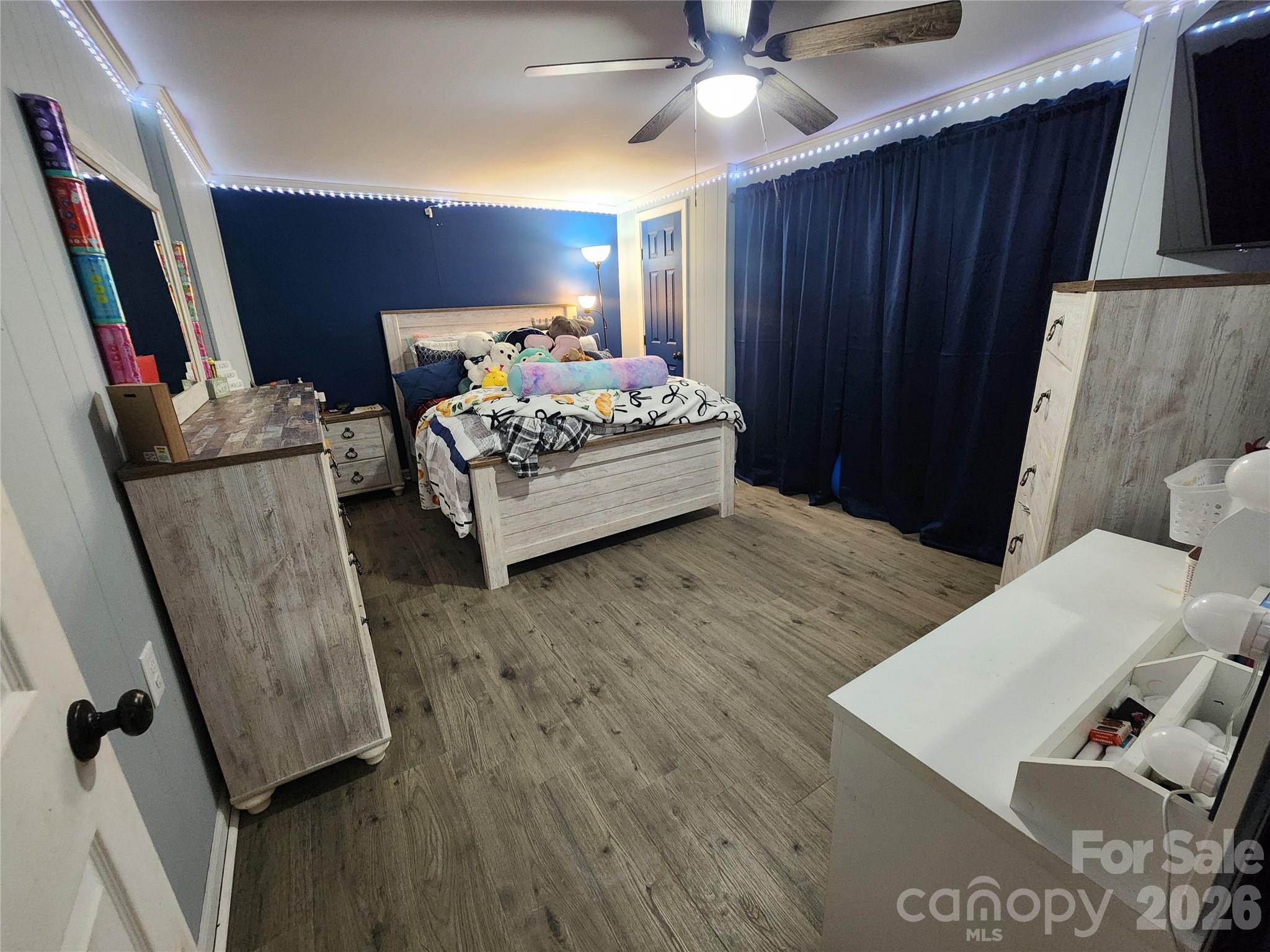 7723 Shoupes Grove Church Road Hickory, NC 28602 - Photo 19 of 24 a bedroom with a bed and a mirror