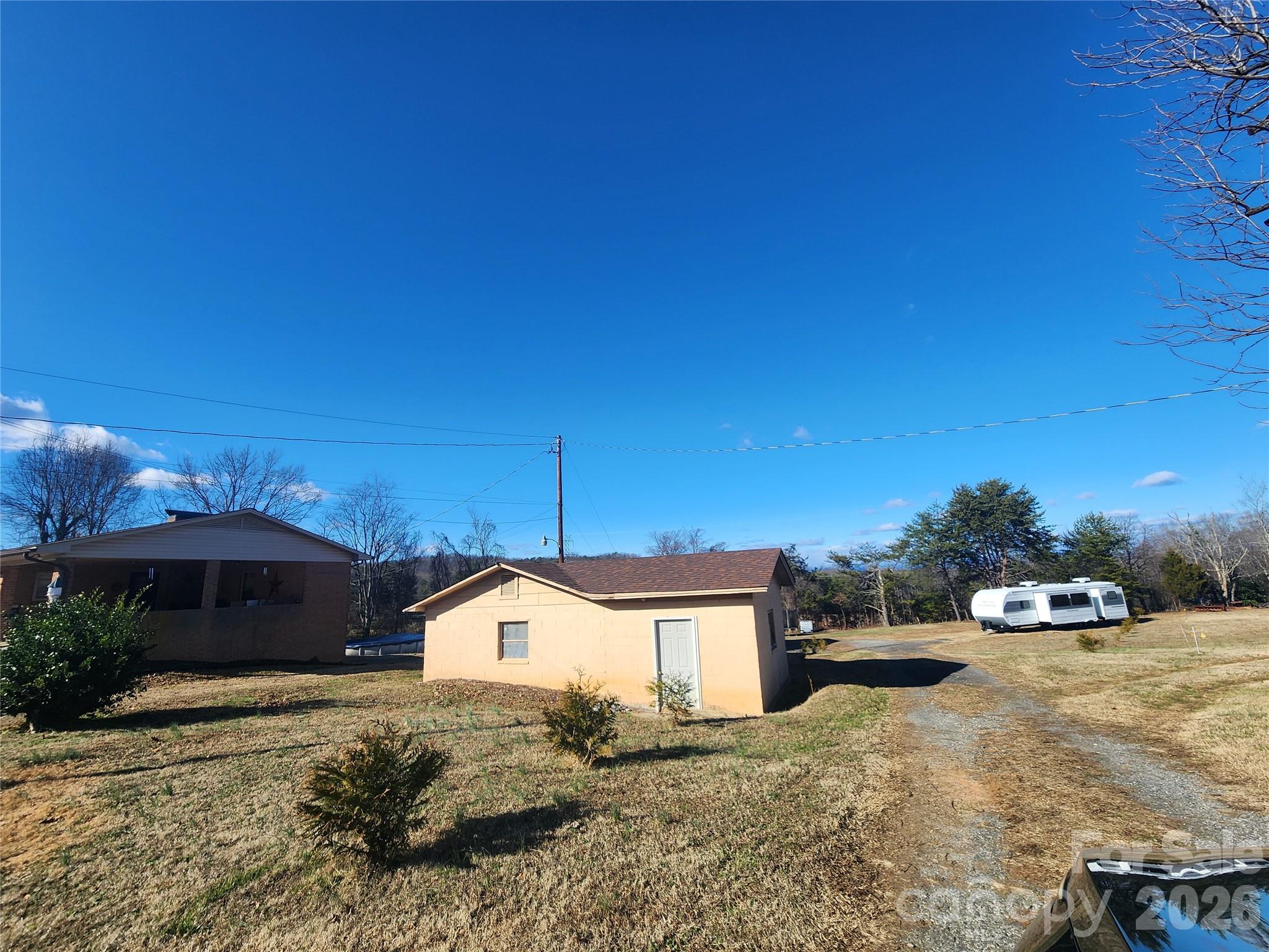 7723 Shoupes Grove Church Road Hickory, NC 28602 - Photo 23 of 24 a front view of a house with a yard