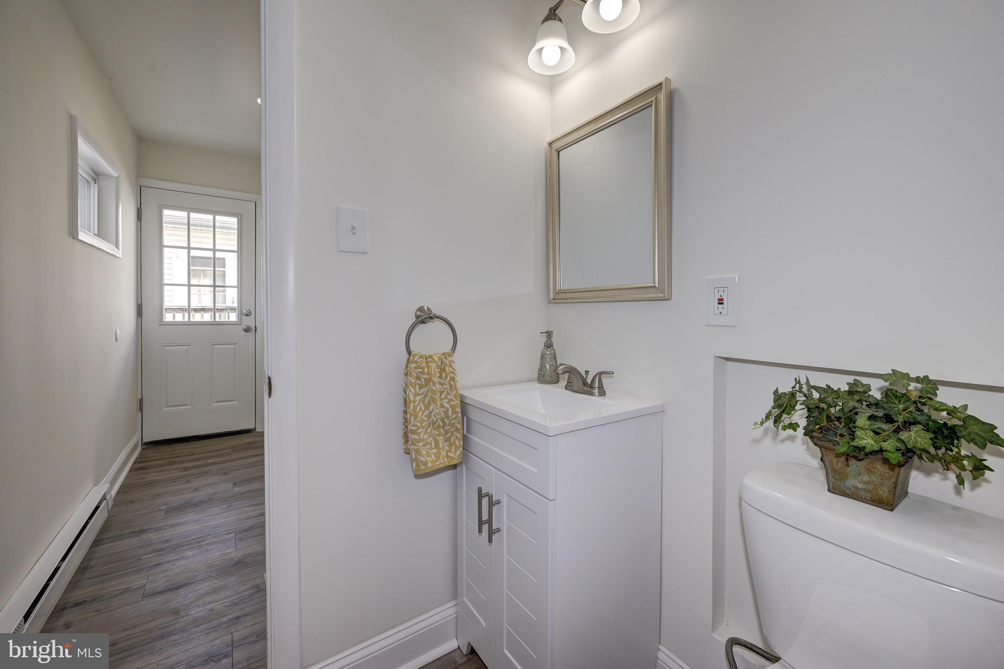304 Cleveland Avenue Riverside, NJ 08075 - Photo 22 of 35 a bathroom with a sink toilet and tub