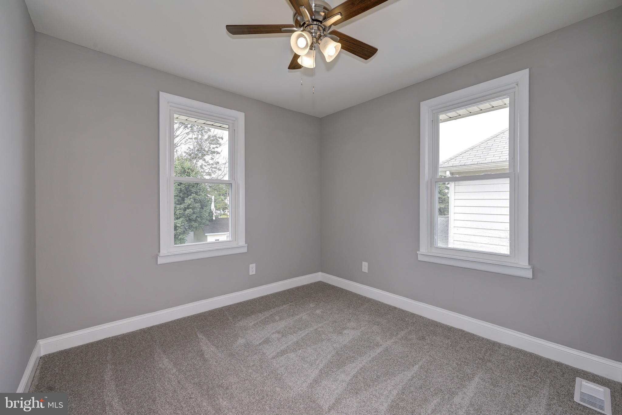 304 Cleveland Avenue Riverside, NJ 08075 - Photo 26 of 35 a view of an empty room with a window
