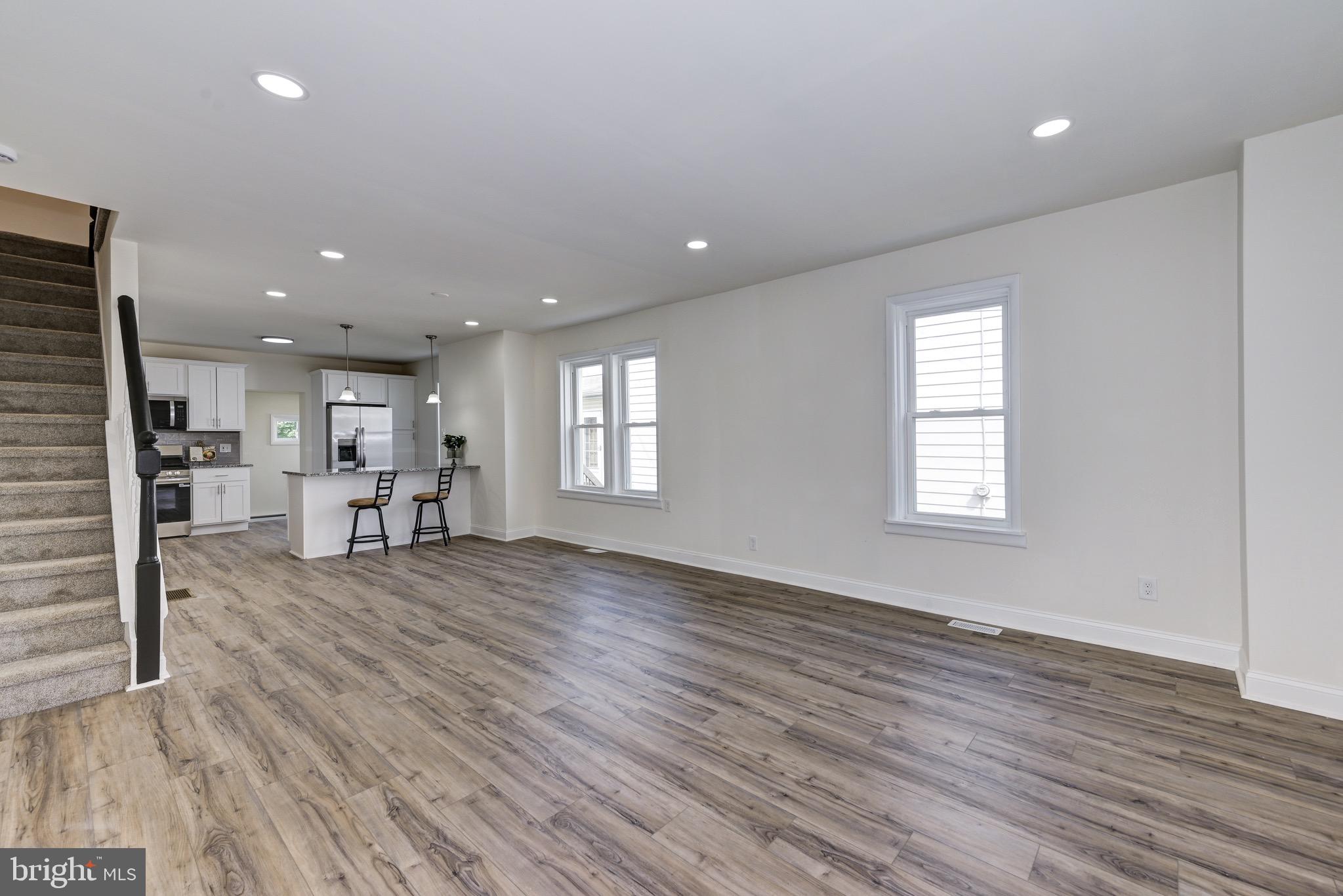 304 Cleveland Avenue Riverside, NJ 08075 - Photo 6 of 35 a view of a kitchen with wooden floor and a kitchen