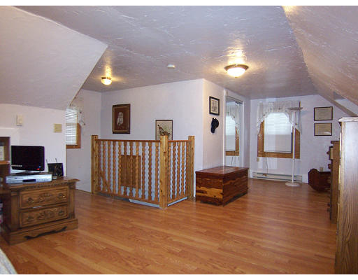 14 Blake Street Springfield, MA 01108 - Photo 8 of 13 a living room with furniture and a flat screen tv