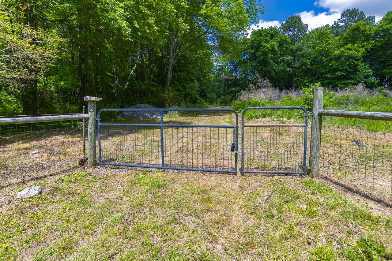 23 Grassy Branch Road Flintville, TN 37335 - Photo 3 of 24 a view of a backyard with fence