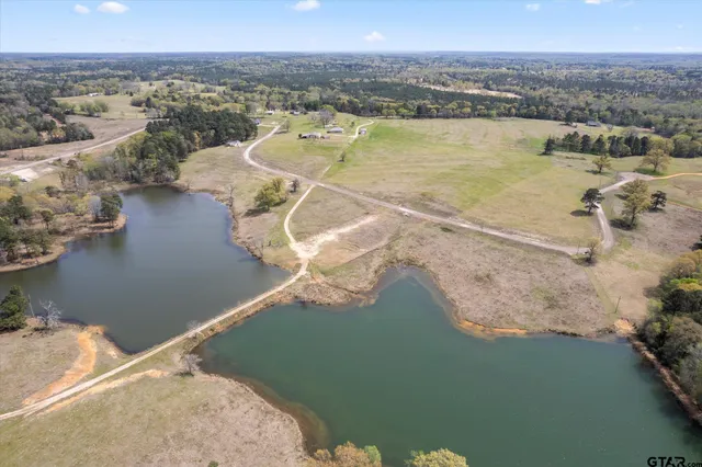 a view of a lake in middle of the town