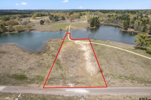 a view of a swimming pool with a lake