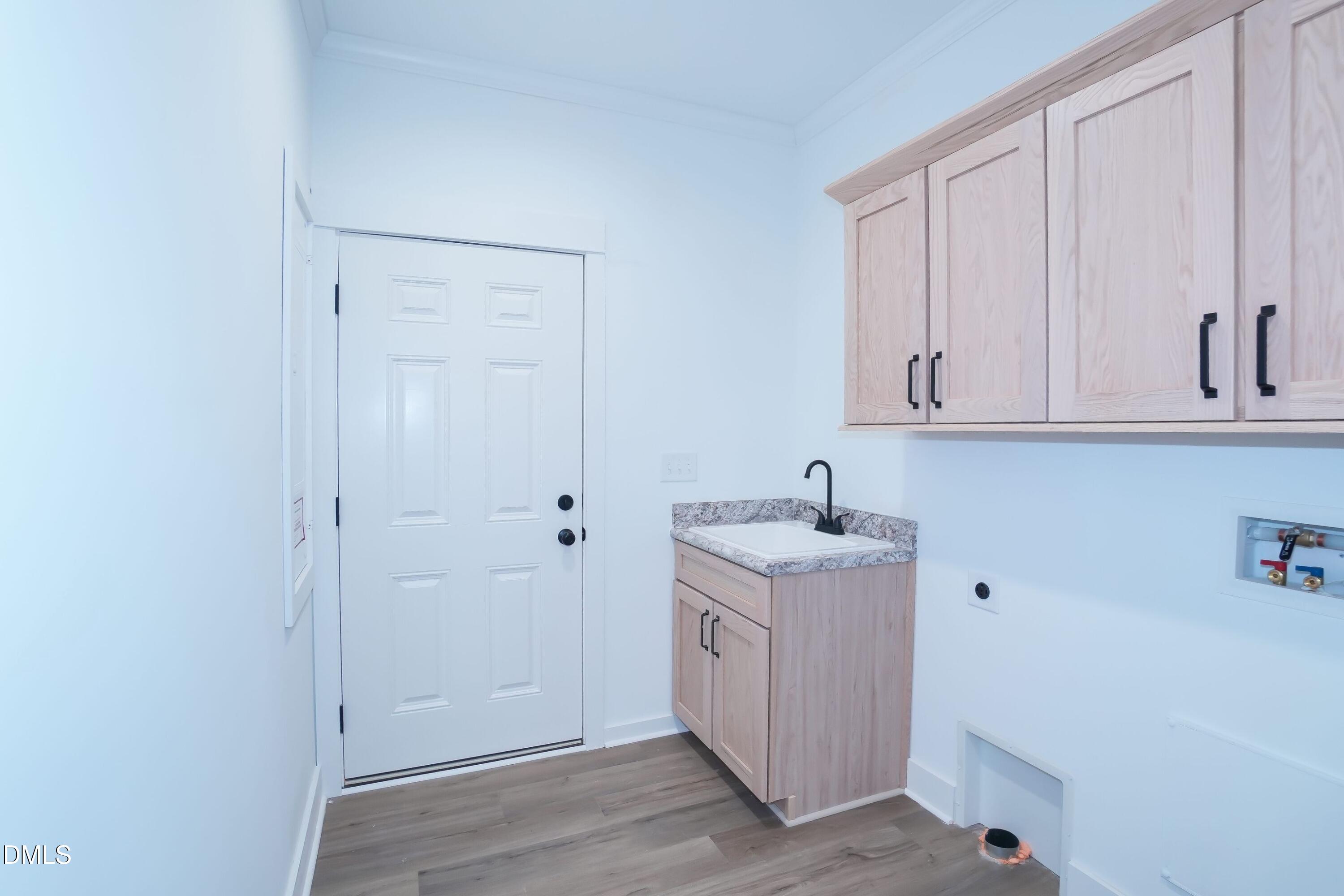 5430 Bass Mountain Road Snow Camp, NC 27349 - Photo 11 of 14 a view of a storage & utility room with a sink
