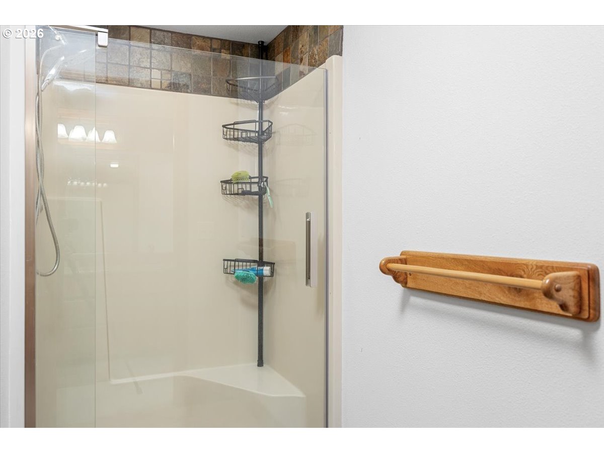 369 Upper Camp Loop Road Roseburg, OR 97470 - Photo 18 of 38 a bathroom with a shower